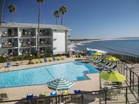 King Bed Partial Ocean and Pool View