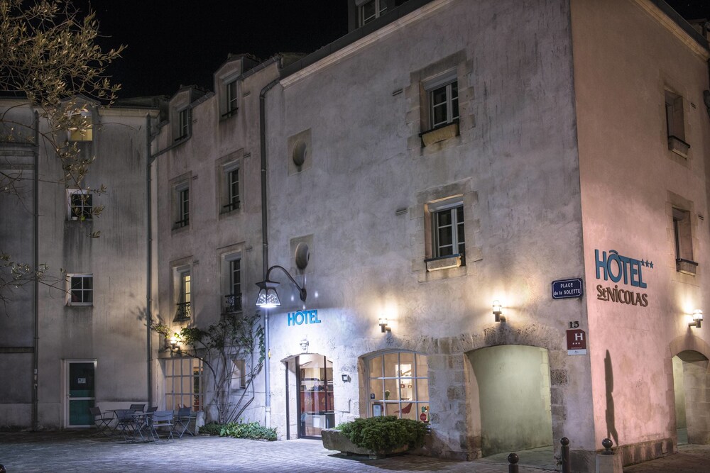 Hotel Front - Evening/Night