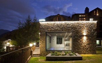 Hotel Front - Evening/Night