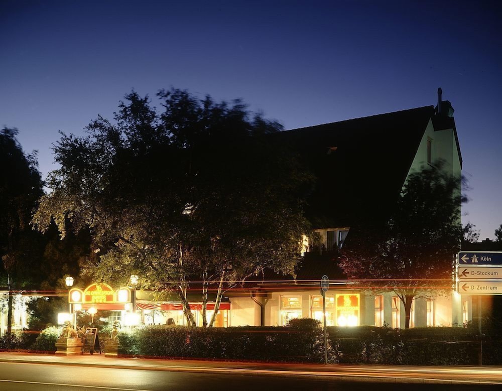 Hotel Front - Evening/Night