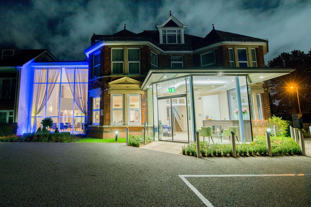 Hotel Front - Evening/Night