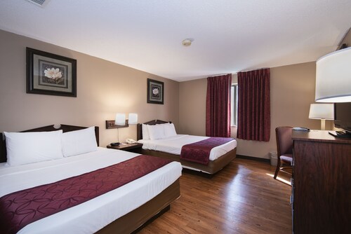 Guest Inn & Suites - Midtown Medical Center