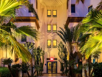 Hotel Front - Evening/Night