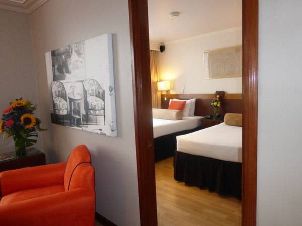 Junior Suite Twin Vistas a la Ciudad - Living Room