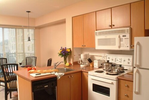 Deluxe Two Bedroom Suite with Full Kitchen & Washer-Dryer - In-Room Kitchen