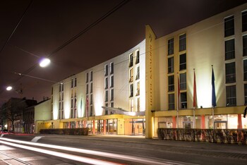 Hotel Front - Evening/Night