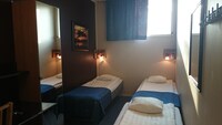 Triple room with shared bathroom and with window (not openable)