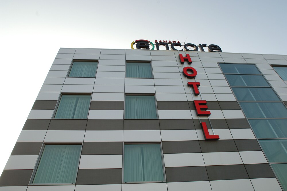 Hotel Front - Evening/Night