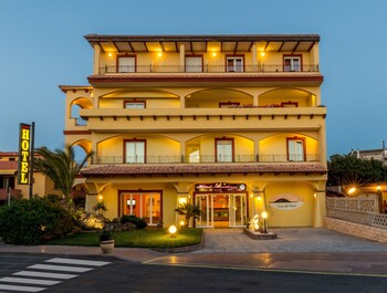 Hotel Front - Evening/Night