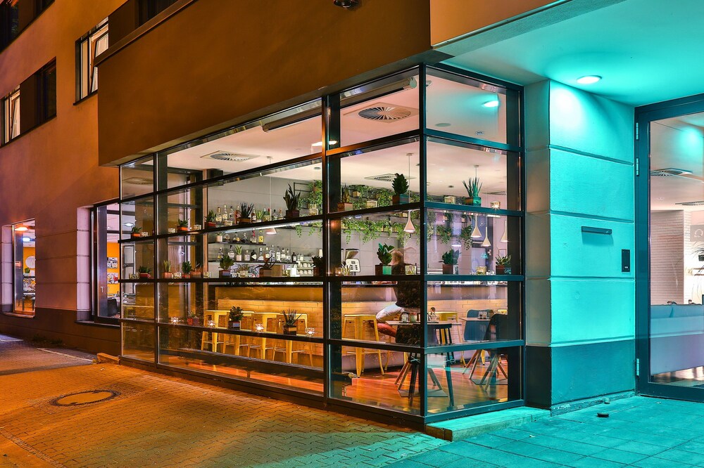 Hotel Front - Evening/Night