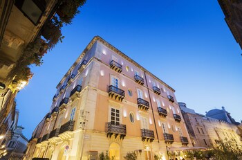 Hotel Front - Evening/Night