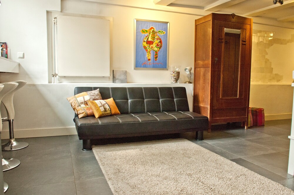 Zitruimte lobby: Studio, 1 tweepersoonsbed en slaapbank, uitzicht op het water (Prinsengracht)
