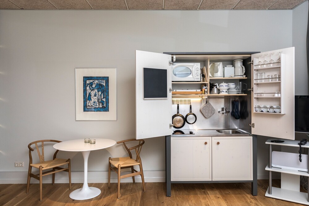 Küche im Zimmer (Appartment G)