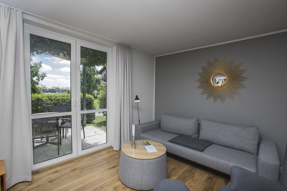 Wohnzimmer (Appartment A, 1 Schlafzimmer)