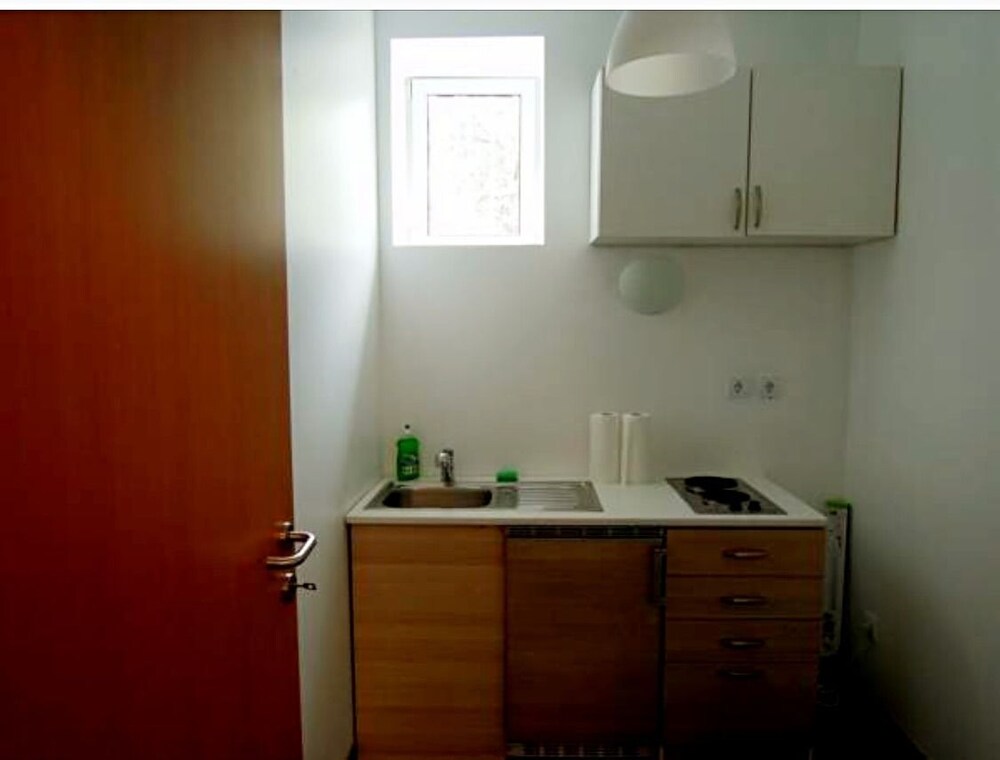 Küche im Zimmer (Familienapartment)