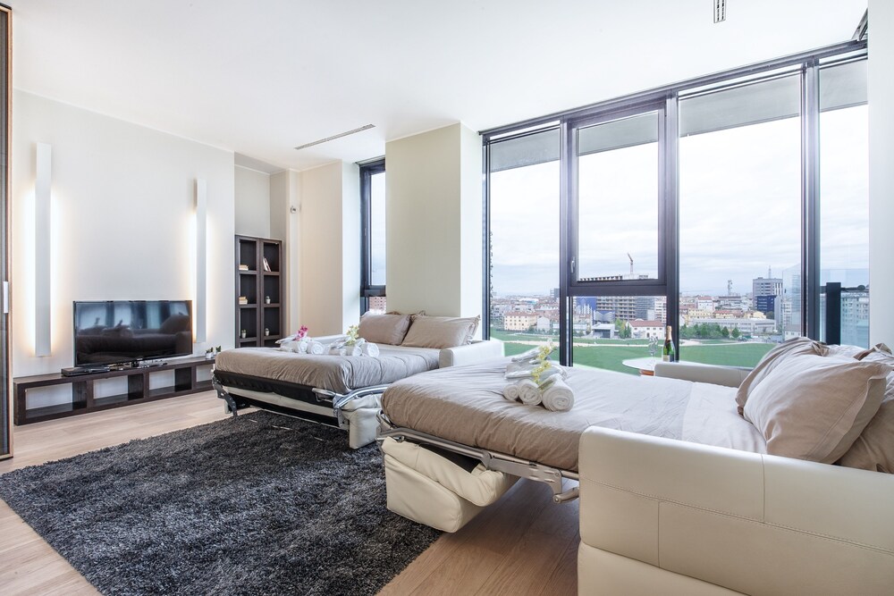 거실 공간 (Suitelowcost Solaria 6 pax (Via Della Liberazione 15 ))