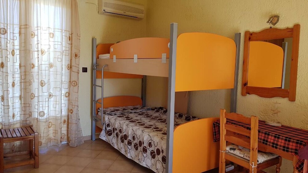 Zimmer (Familienzimmer, Poolblick)