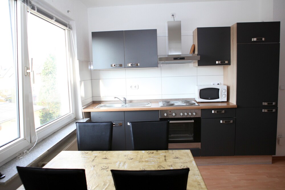 Küche im Zimmer (Apartment, 2 Schlafzimmer, Stadtblick (Apartment am Ring | Johanniterstr. 31))