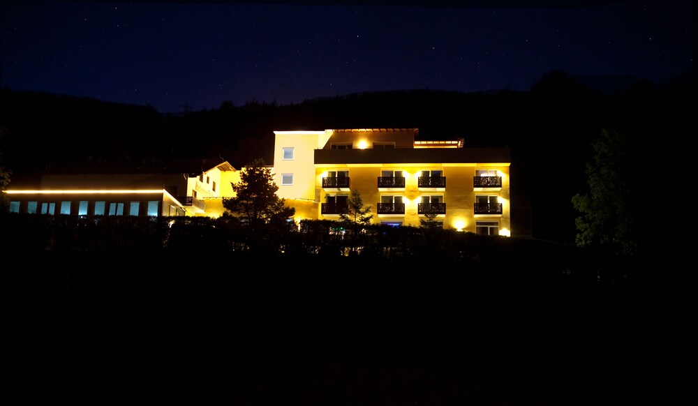 Hotel Front - Evening/Night