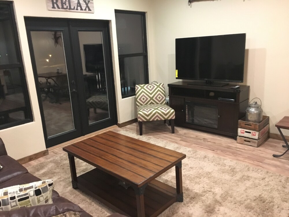 Wohnzimmer (Exclusive-Suite, 1 Schlafzimmer, Seeblick, Seeseite)