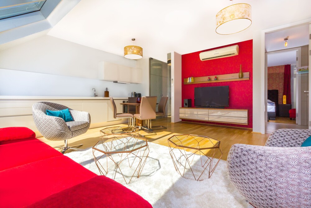 Wohnbereich (Deluxe-Maisonette, 1 King-Bett, Stadtblick)