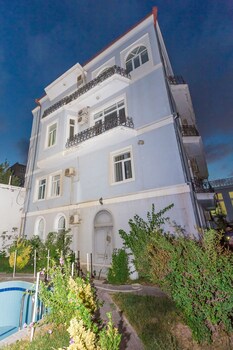 Hotel Front - Evening/Night