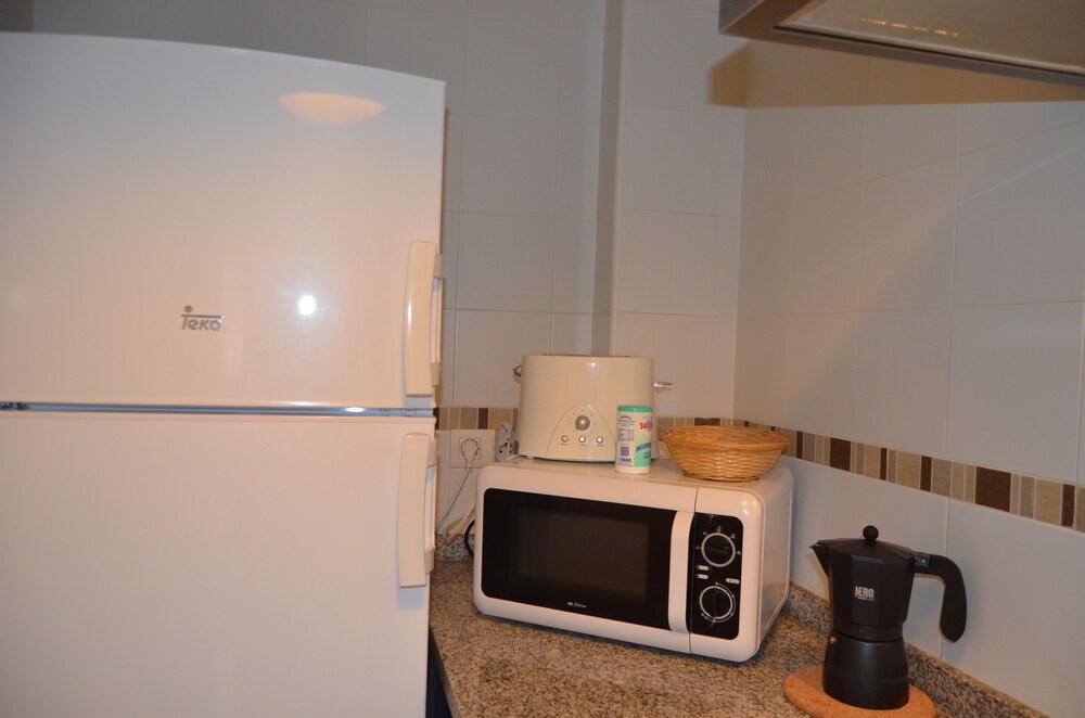 Cucina in camera (Monolocale Deluxe, terrazzo)
