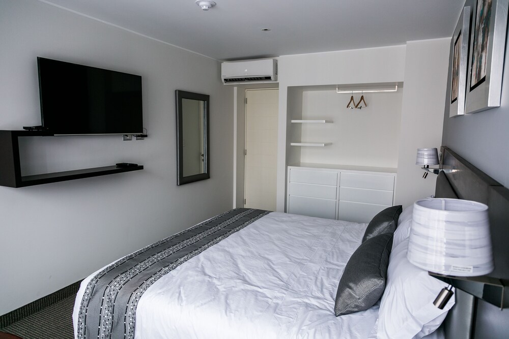 Habitación: Suite junior, 1 cama de matrimonio grande, frigorífico y microondas, en una planta alta