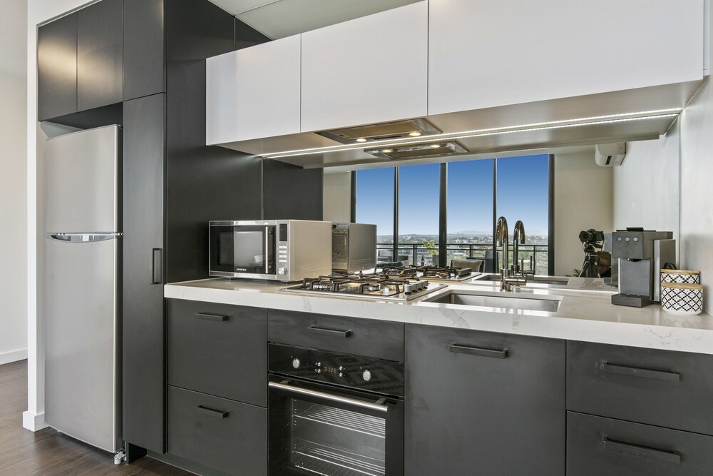 Deluxe Two Bedroom Apartments - In-Room Kitchen