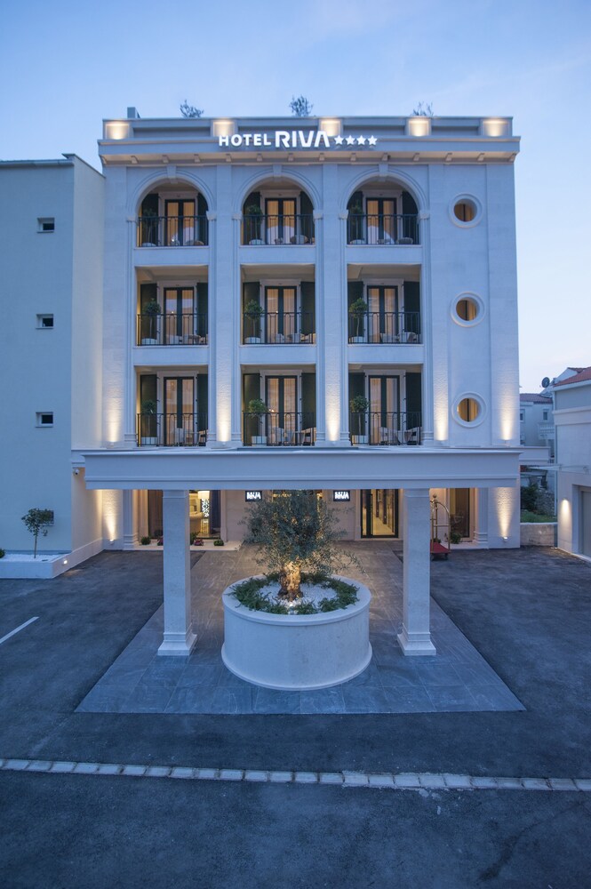 Hotel Front - Evening/Night