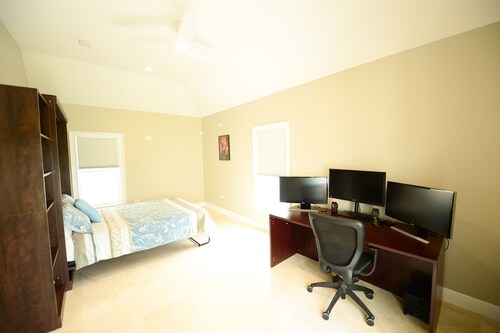 Modern condo steps from the beach