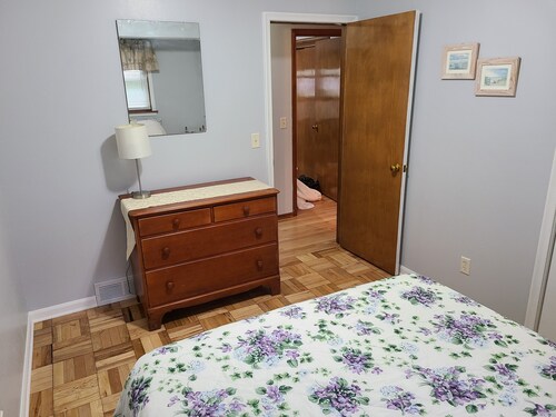 This 4 BR Home With A Great Game Room Is Located Close To Shopping And Dining