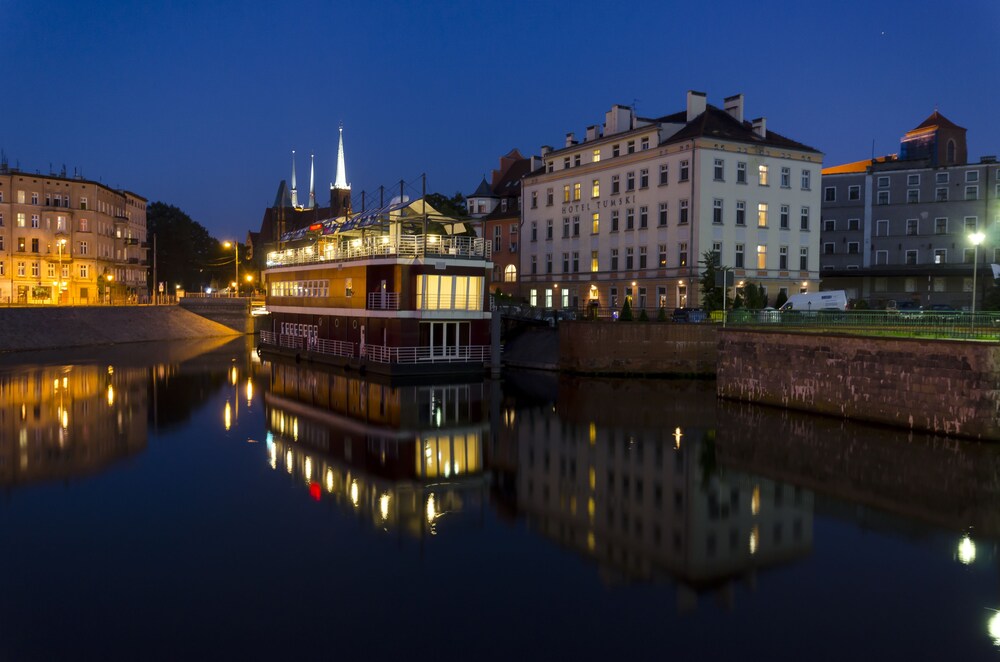 Hotel Front - Evening/Night
