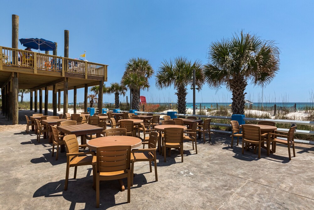 Outdoor dining, Ramada by Wyndham Panama City Beach / Beachfront