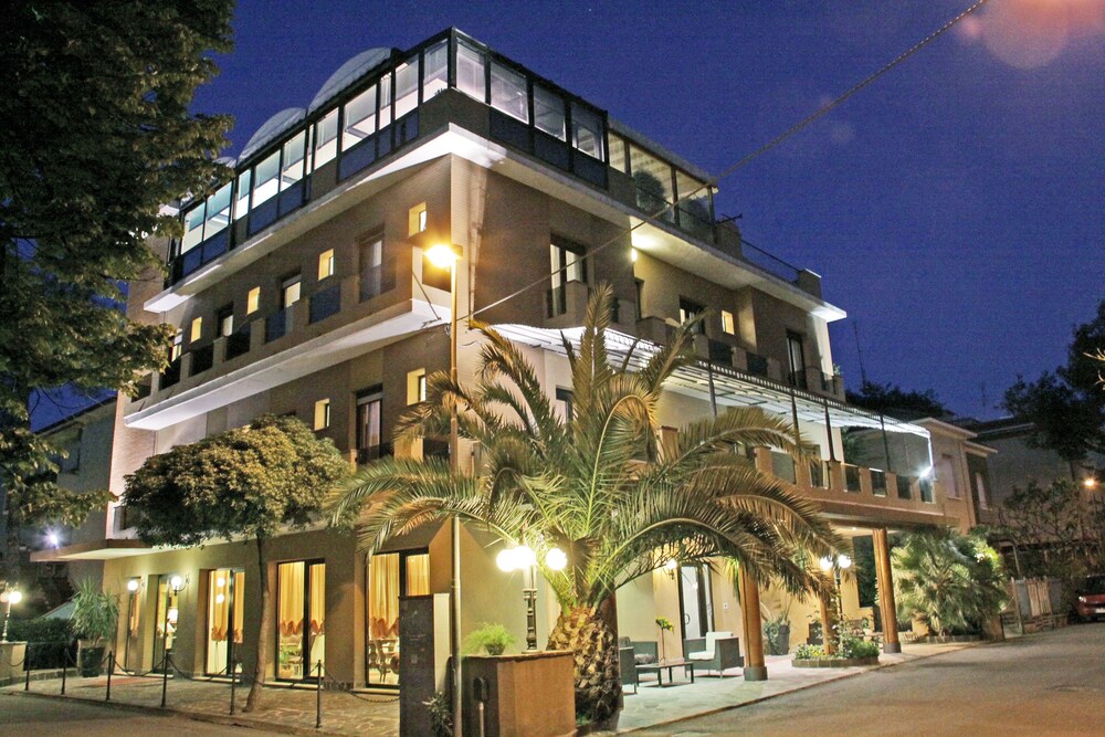 Hotel Front - Evening/Night