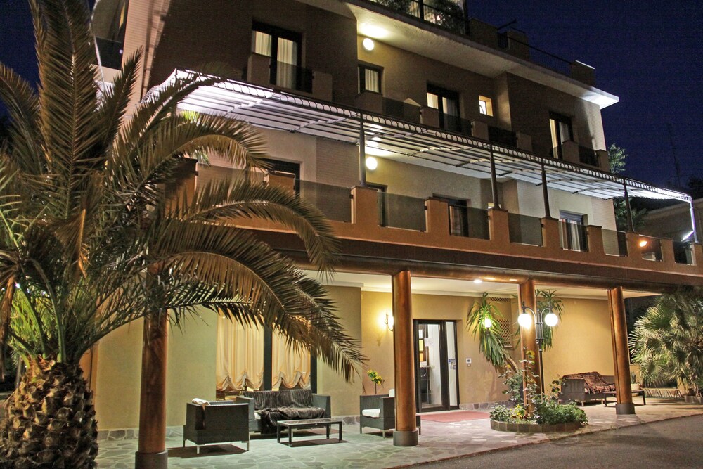 Hotel Front - Evening/Night