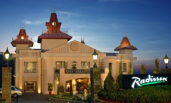 Hotel Front - Evening/Night