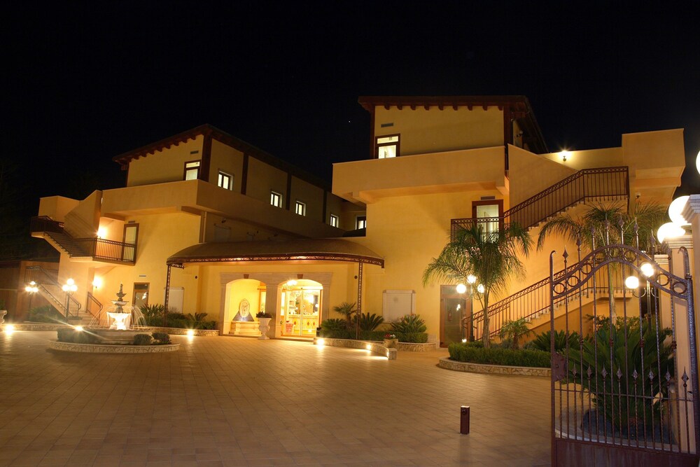 Hotel Front - Evening/Night