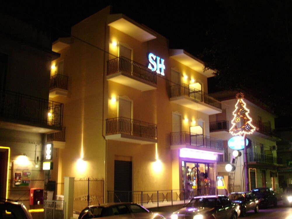 Hotel Front - Evening/Night
