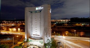 Hotel Front - Evening/Night
