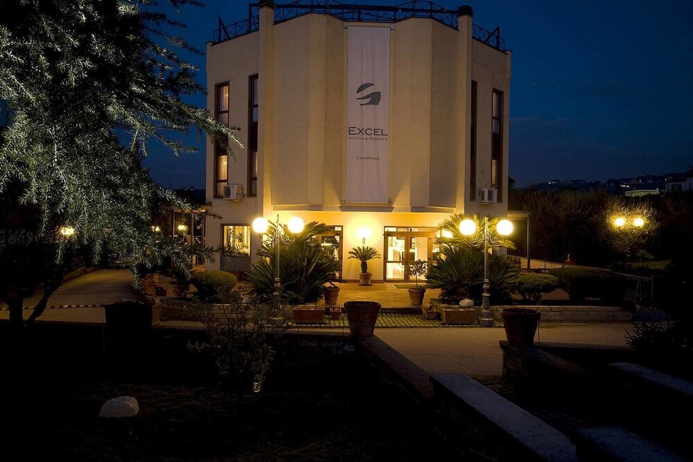 Hotel Front - Evening/Night