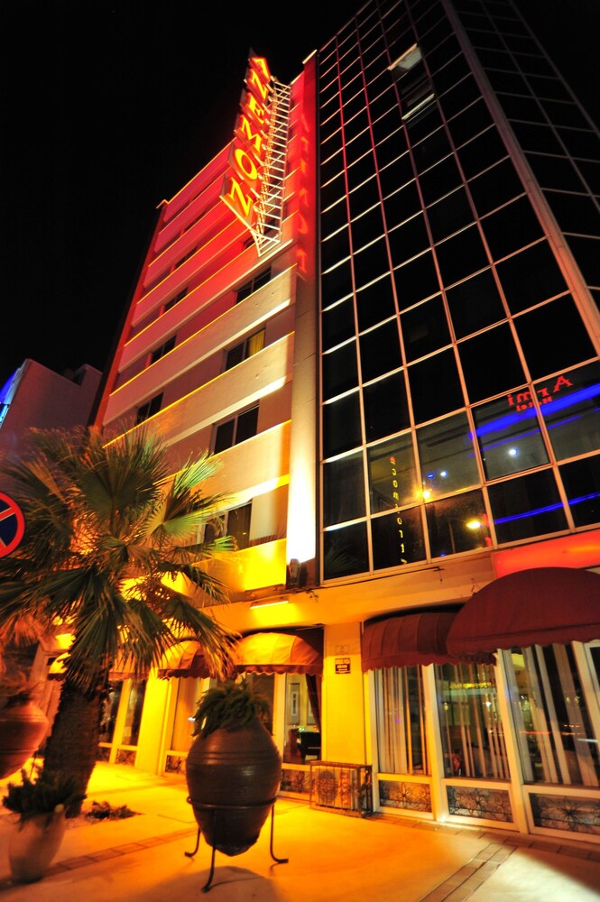 Hotel Front - Evening/Night