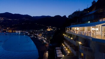 Hotel Front - Evening/Night