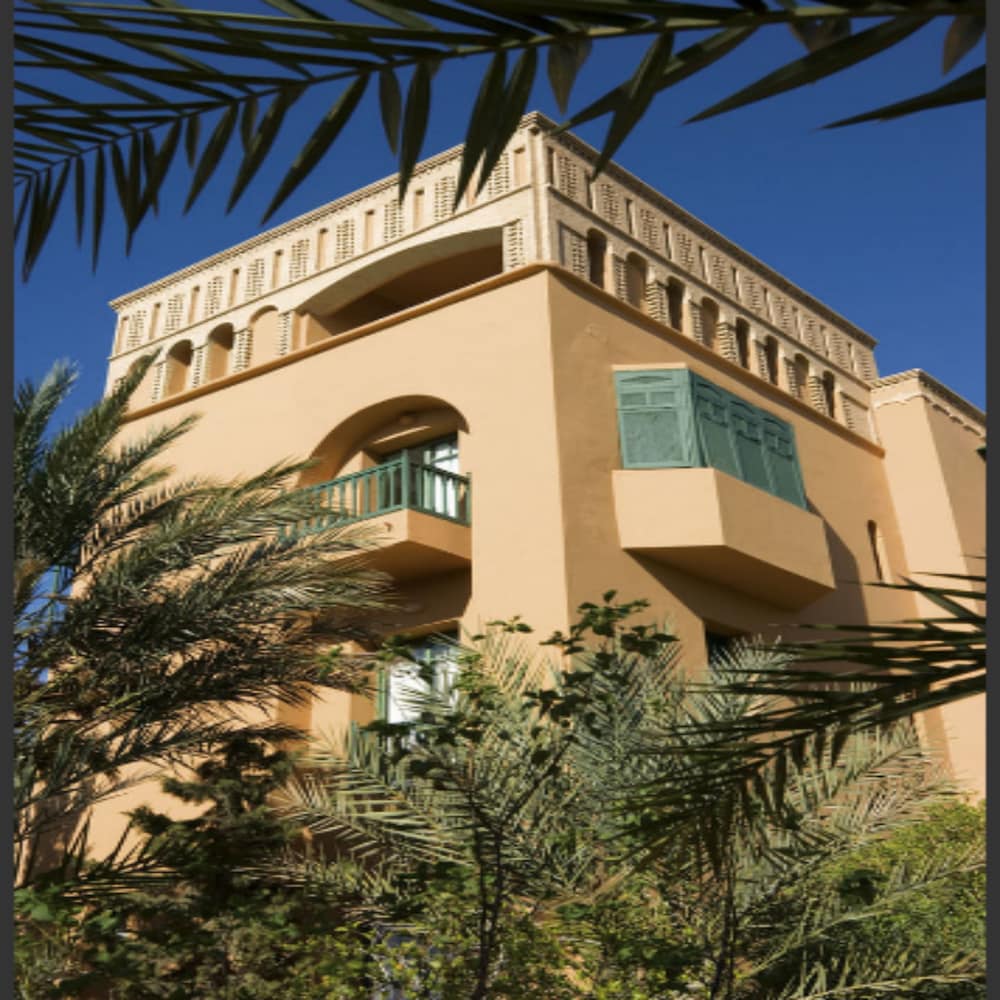 Hotel Front - Evening/Night