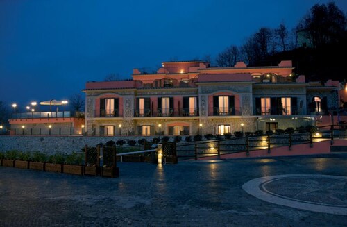Hotel Front - Evening/Night