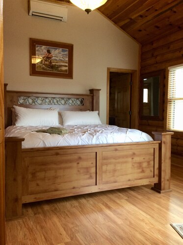 Captivating 5 Bed/5 Bath Lake Front Log Cabin W/ Private Cove & Sandy Beach.