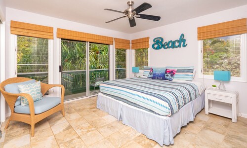 REDUCED RATE! Nestled Along a Stream & Tropical Surroundings.
