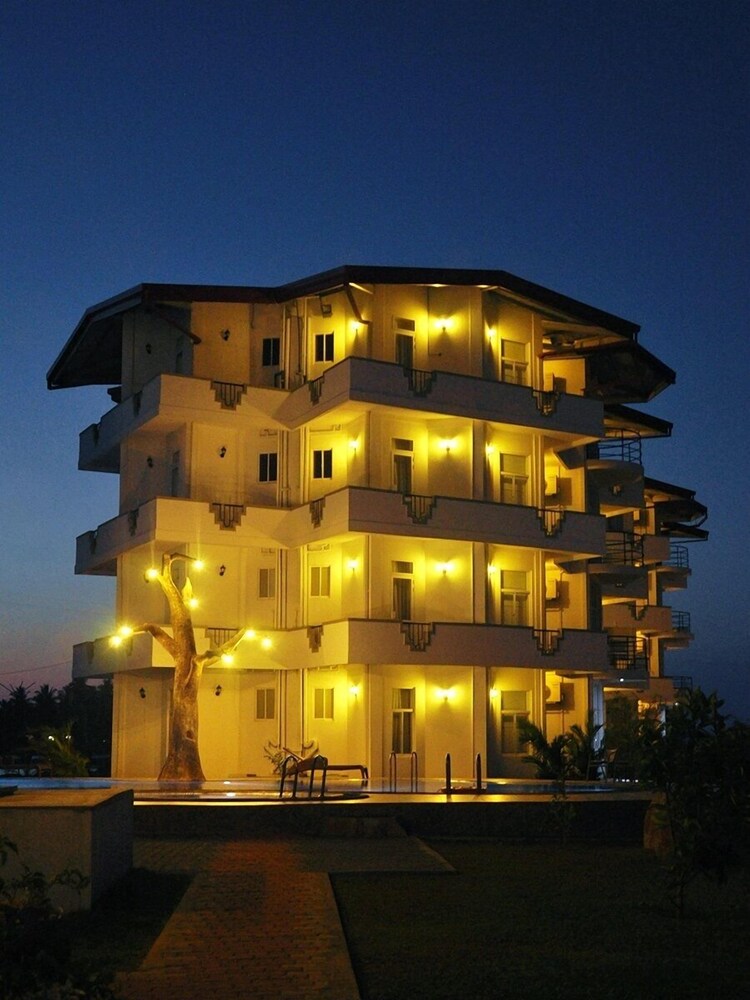 Hotel Front - Evening/Night