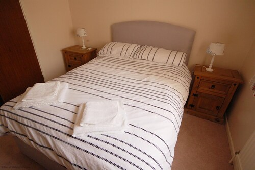 This ground floor apartment benefits from its own courtyard garden, parking and is pet friendly