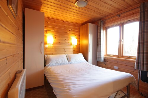 The lodge offers stunning views West to Ben Wyvis and North to the hills and mountains of East Suthe